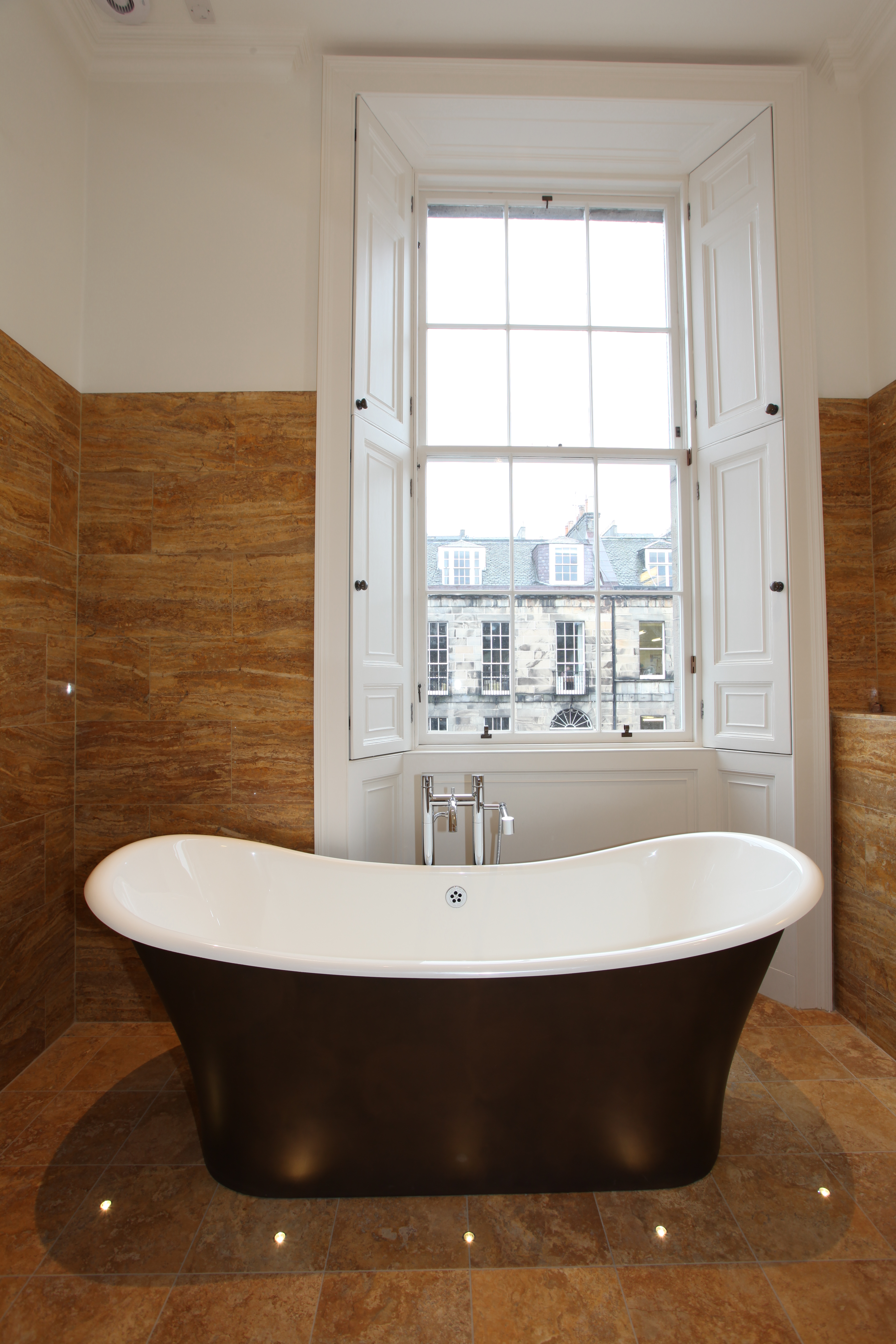 Edinburgh Freestanding Rolltop bath with floor standing tap in traditional room